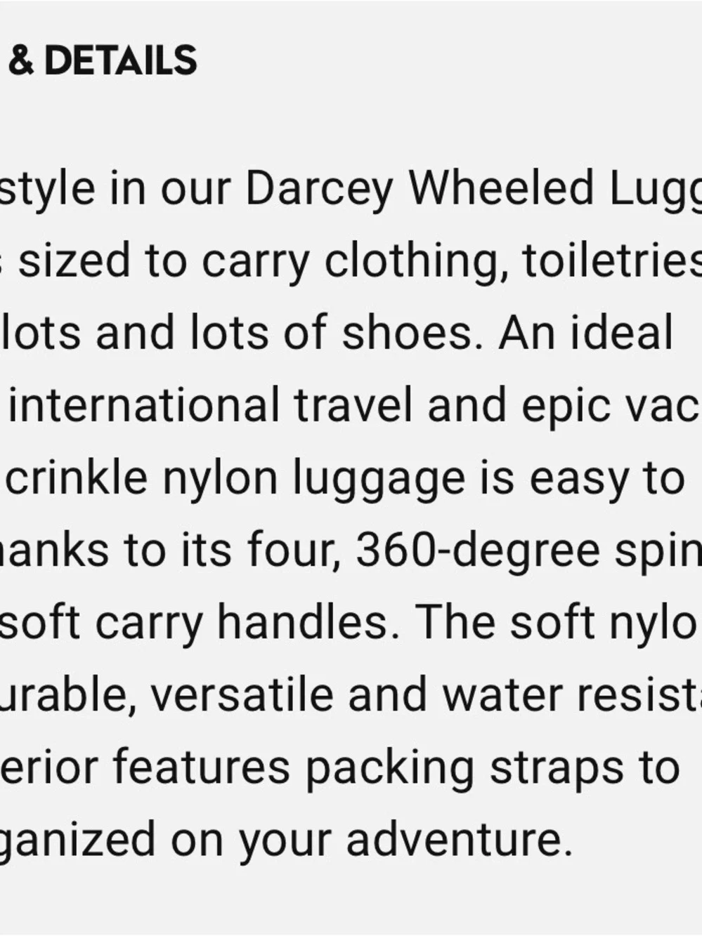Kipling Dark Navy Upright Rolling Suitcase with Monkey Charm
